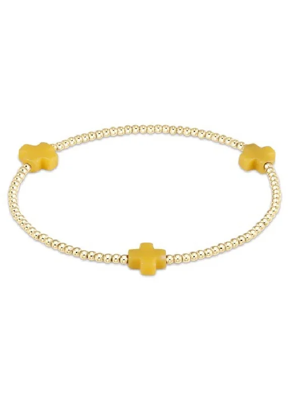 gold bangles for women -SIGNATURE CROSS BRACELET - YELLOW